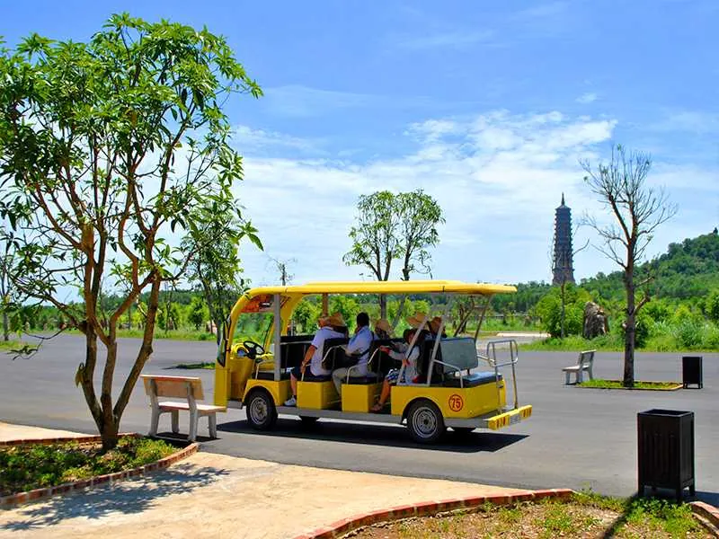 Getting Around Ninh Binh: Local Transport Guide 2026 Electric cart transport at Bai Dinh Pagoda complex Ninh Binh