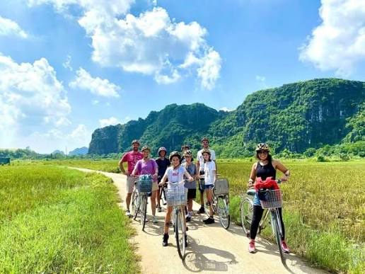 Cycling through countryside near Kenh Ga