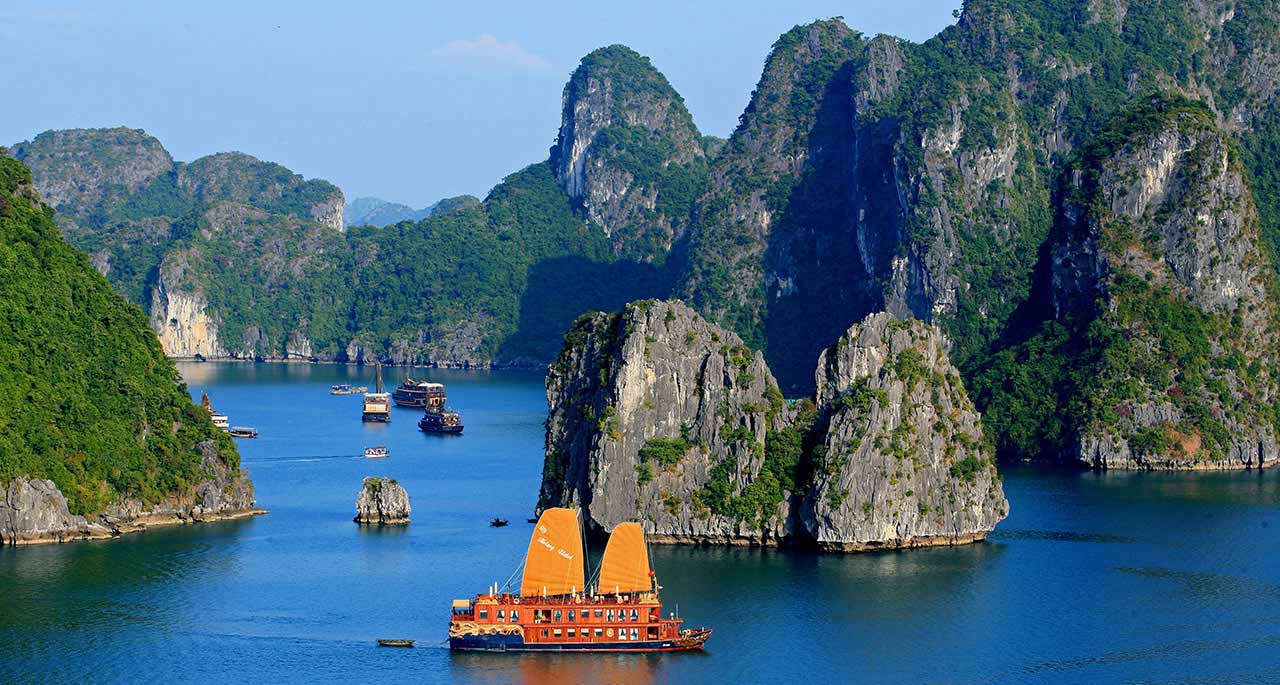 Ninh Binh to Hue Train: Reunification Express Guide 2026 Coastal scenery viewed from Reunification Express train window
