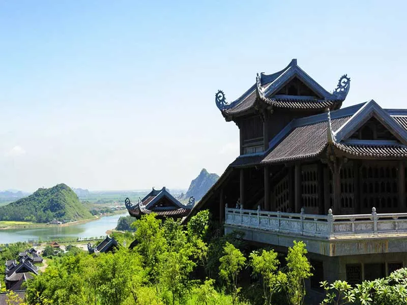 Ninh Binh Destinations 2026: Complete Guide to 9 UNESCO Heritage Sites & Hidden Gems Bai Dinh Pagoda complex overlooking the river, Ninh Binh