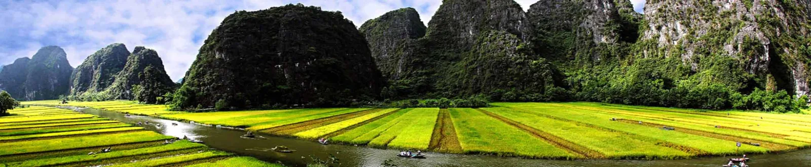Ninh Binh Destinations 2026: Complete Guide to 9 UNESCO Heritage Sites & Hidden Gems Panoramic view of Ninh Binh's limestone karst and rice fields