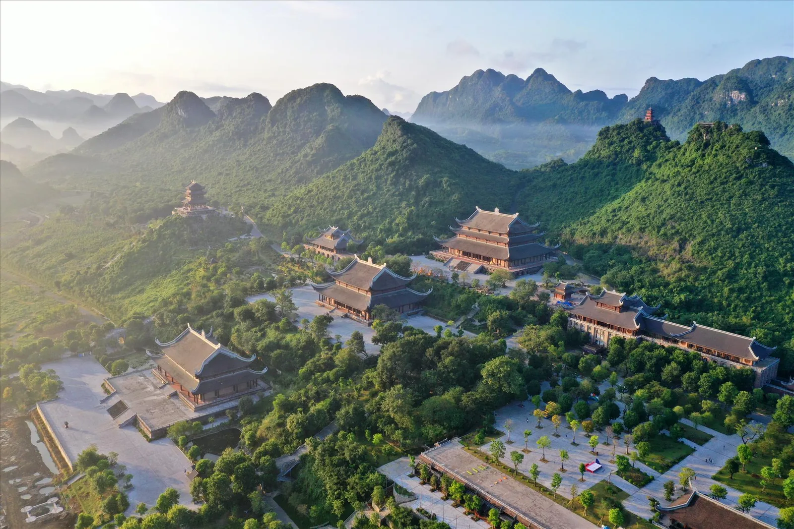 Aerial view of Tam Chuc Pagoda Complex among Ninh Binh's misty mountains
